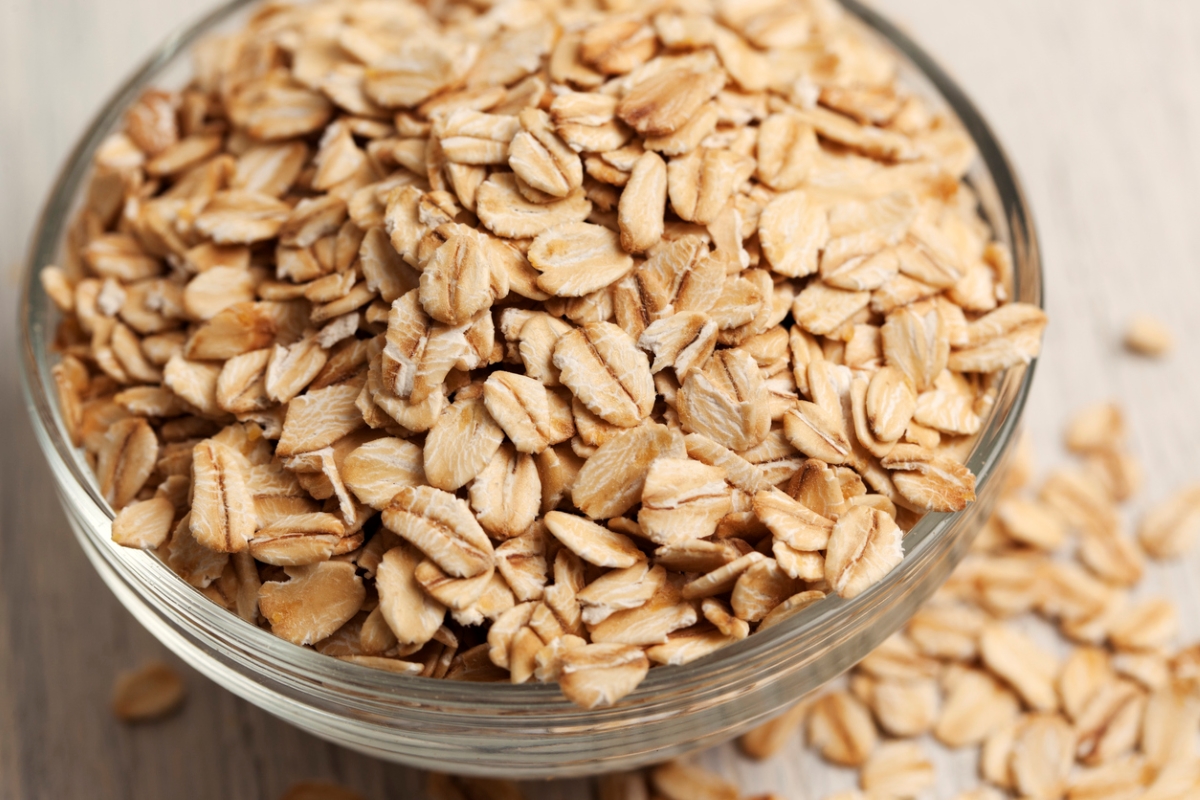 foods that never expire - oat grains in clear bowl
