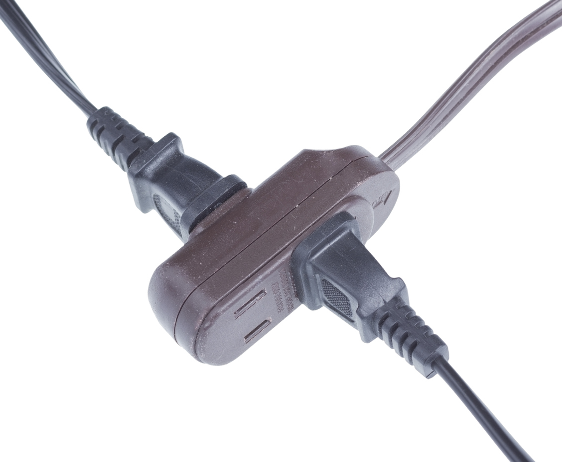 two cords plugged into extension cord