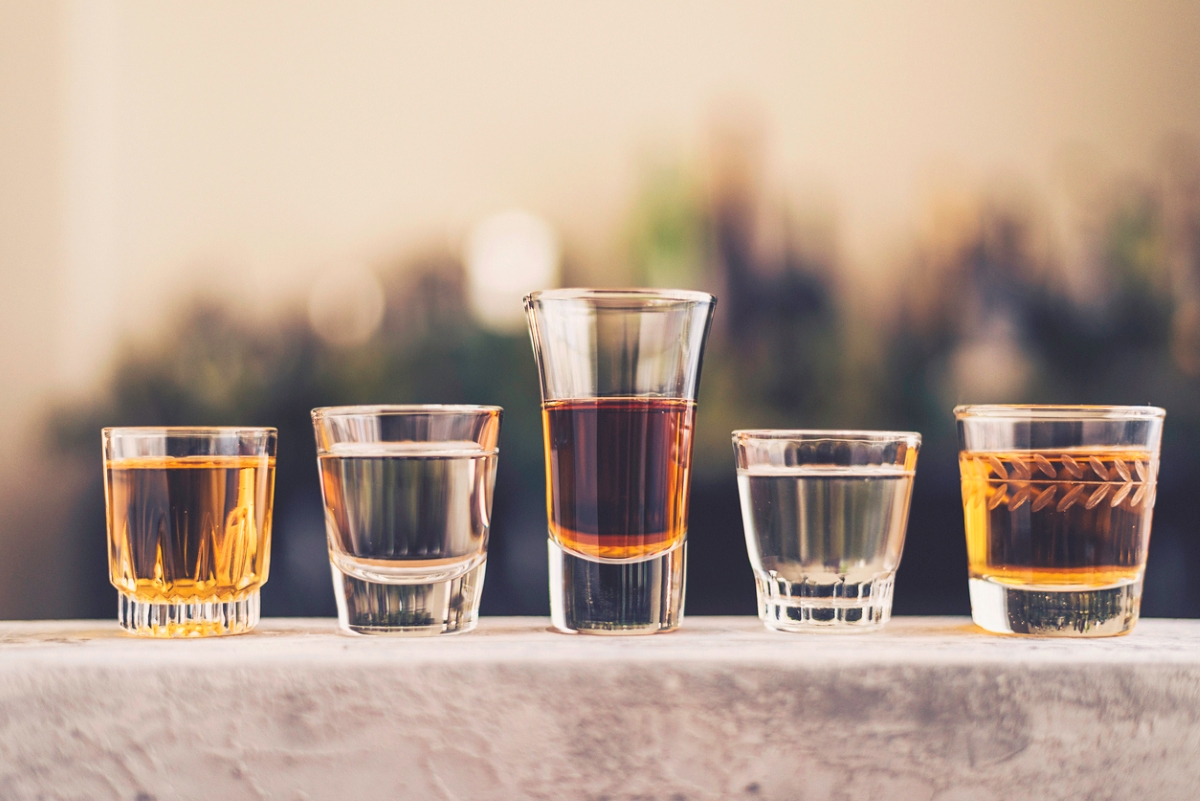 foods that never expire - multiple clear shot glasses with different alcohols