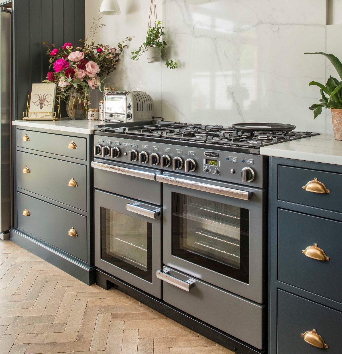 Horizontal oven in dark colored kitchen