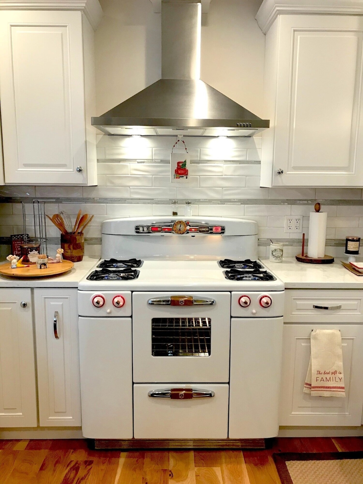 Vintage white stove with storage in modern kitchen.