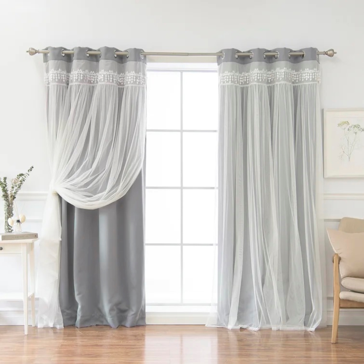 Layers of gray curtains on window
