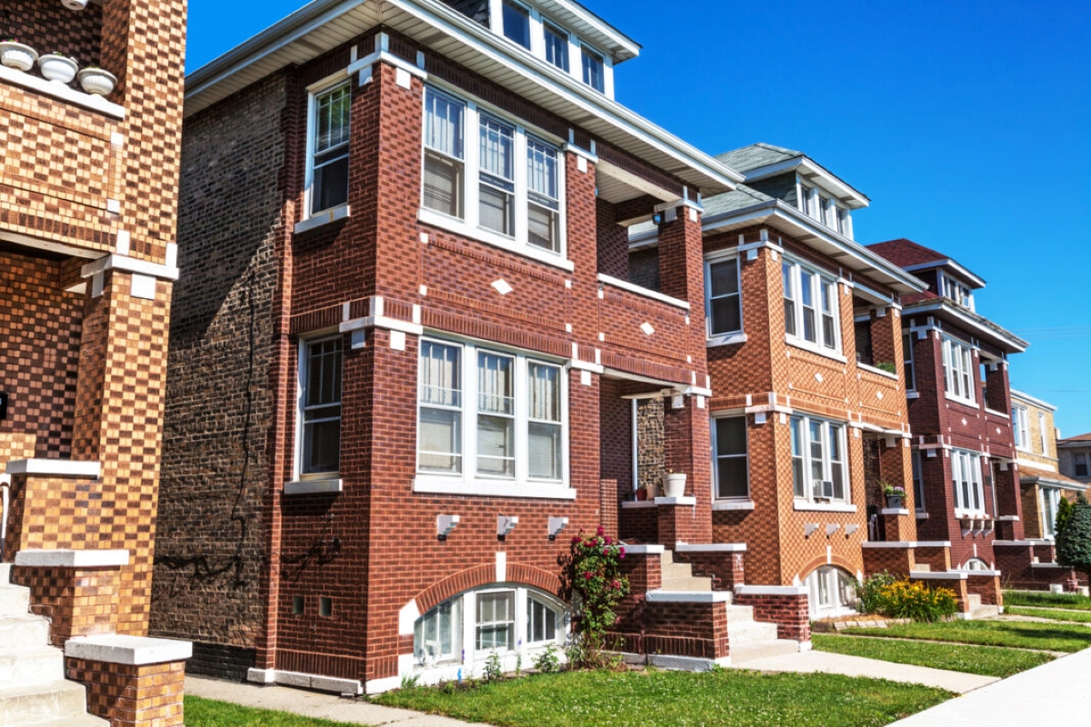 how to choose a rental property - multiple brick public housing homes