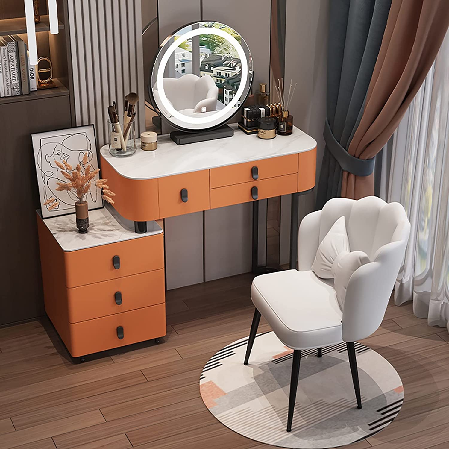 orange accented vanity table with white chair