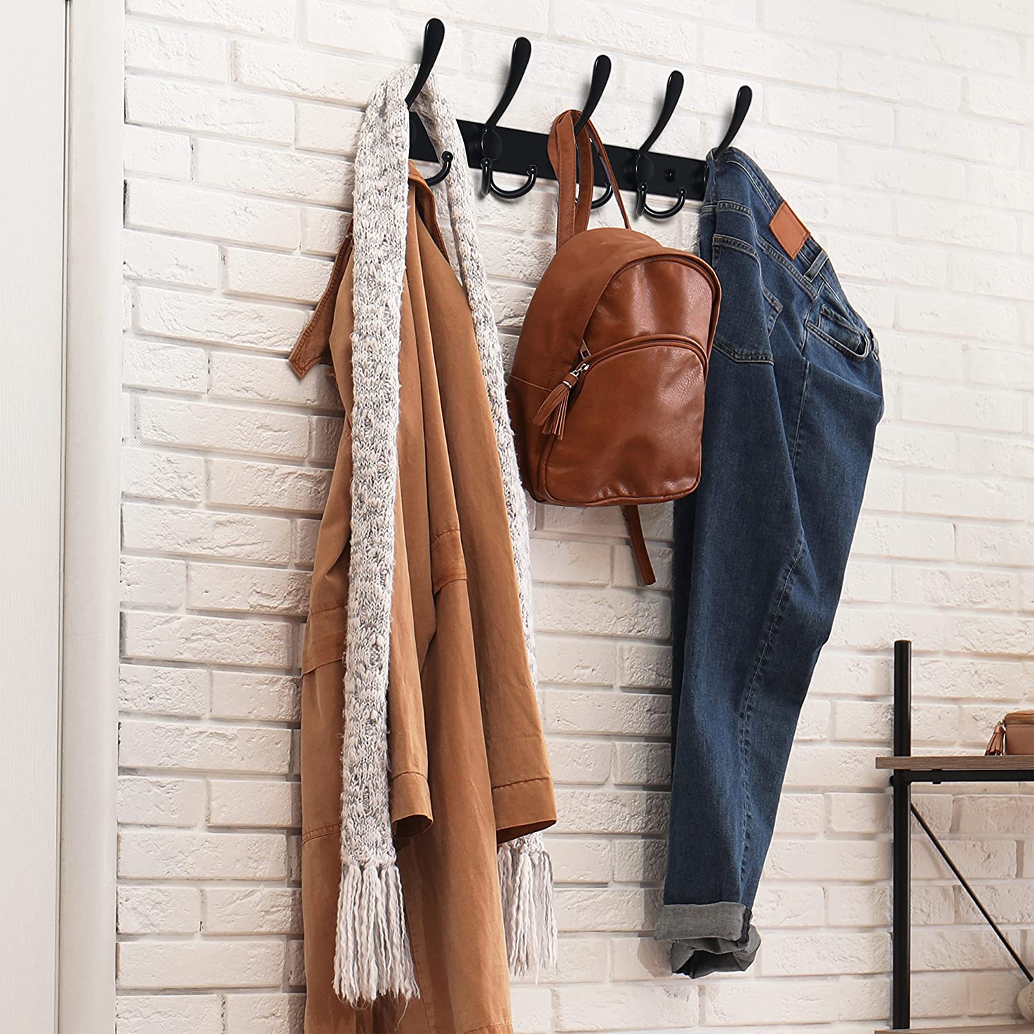 Clothes and accessories hanging from Dseap Wall Mounted Metal Coat Hooks
