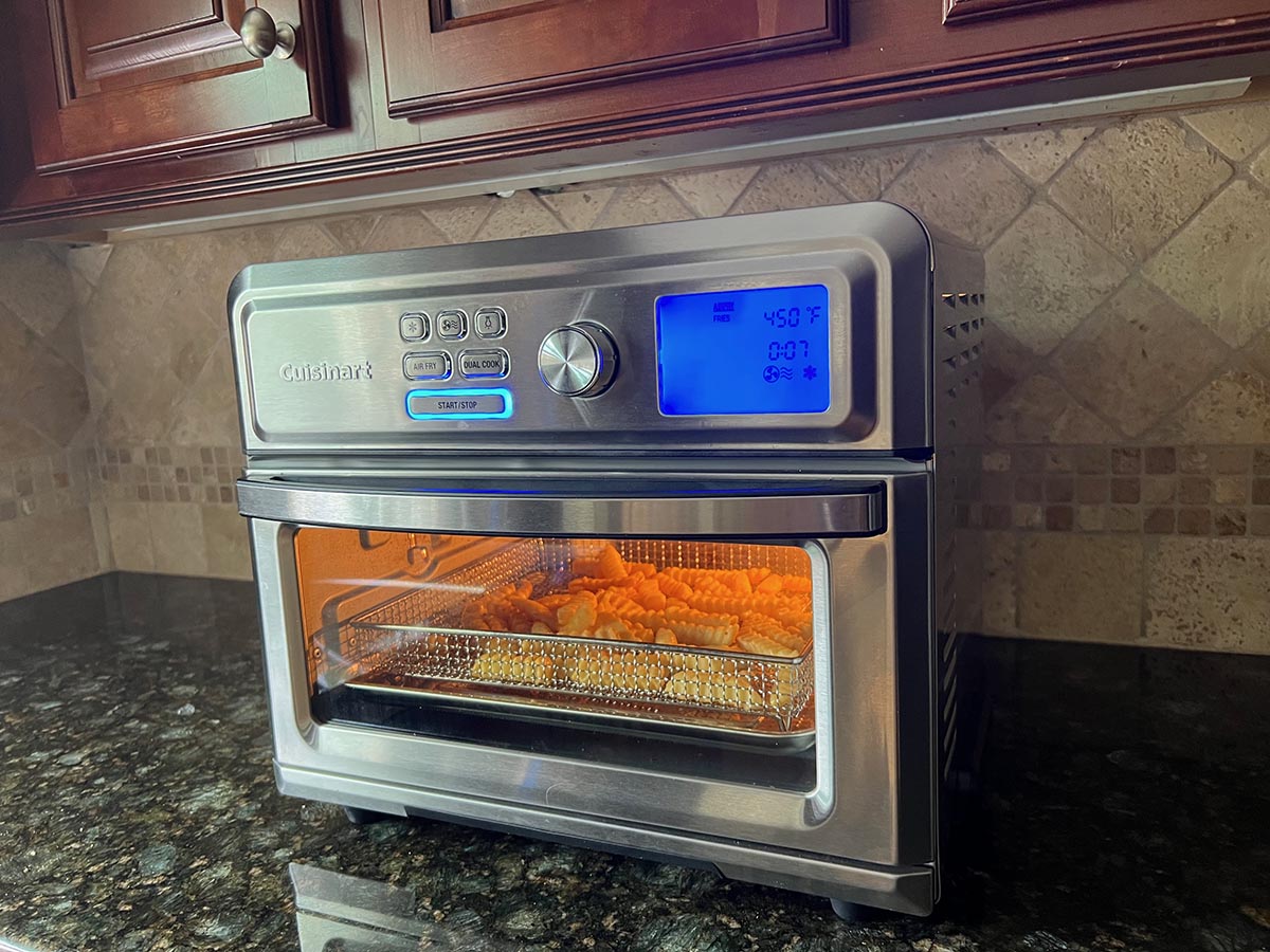 French fries cooking in Cuisinart air fryer toaster oven