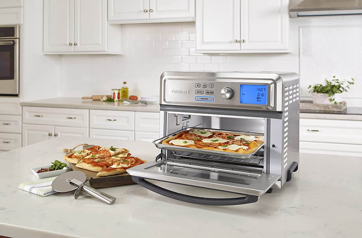 The Best Countertop Oven Option cooking a pizza on a kitchen island
