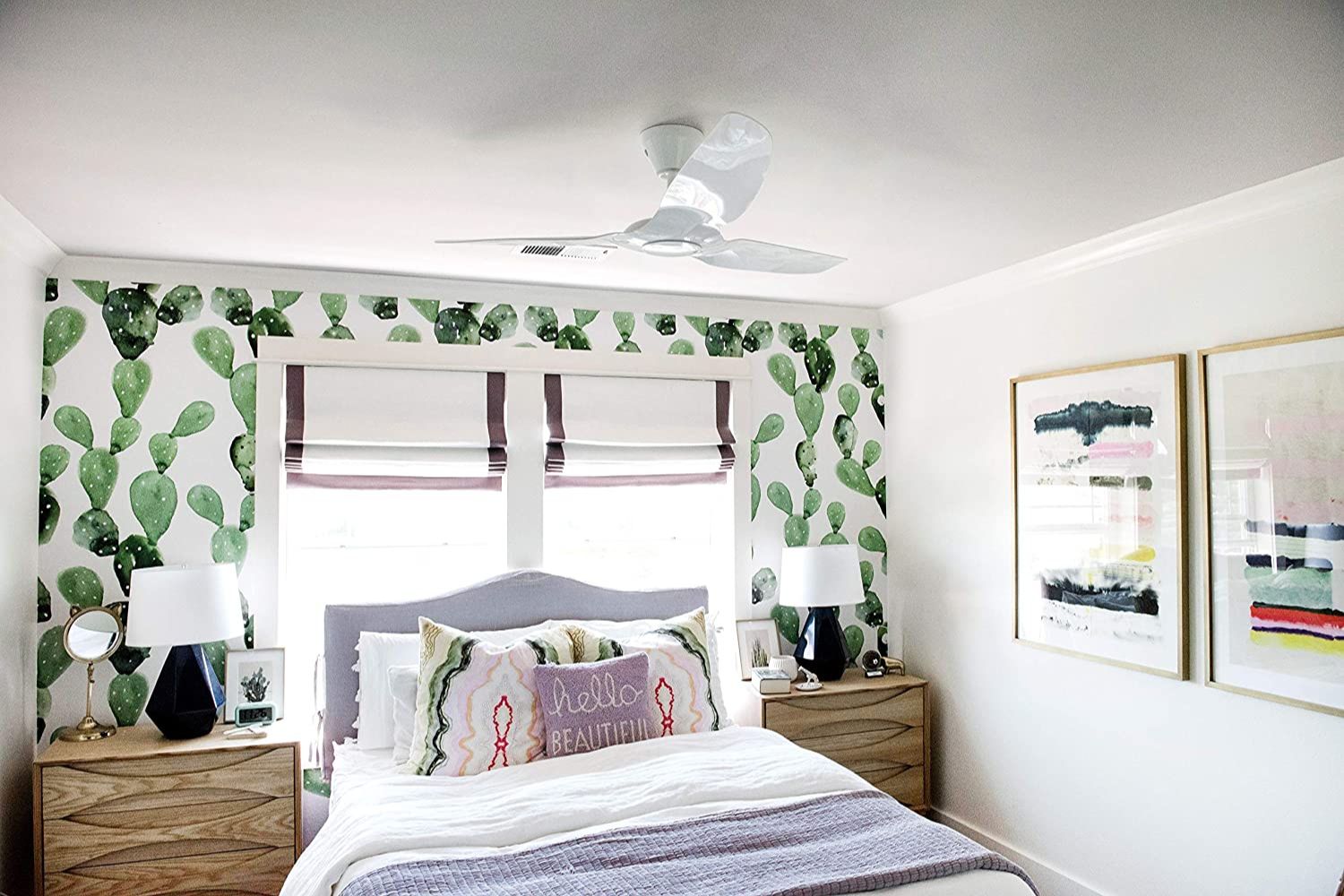 The Best Smart Ceiling Fans Option hanging in a bright and tidy bedroom