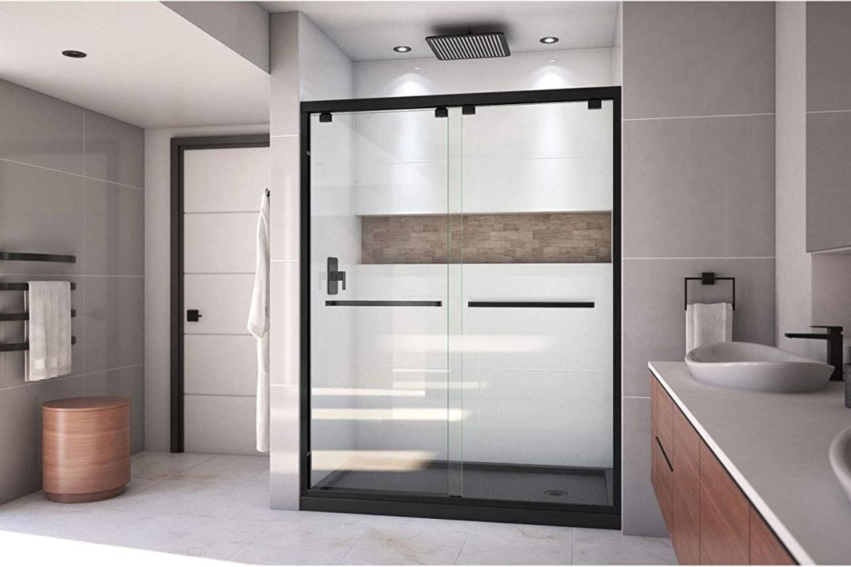 A large shower door in a bright bathroom