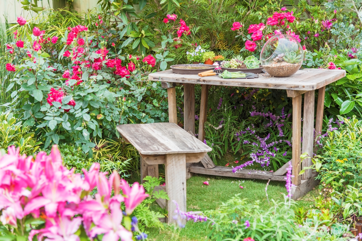 Gardening table and tools in garden