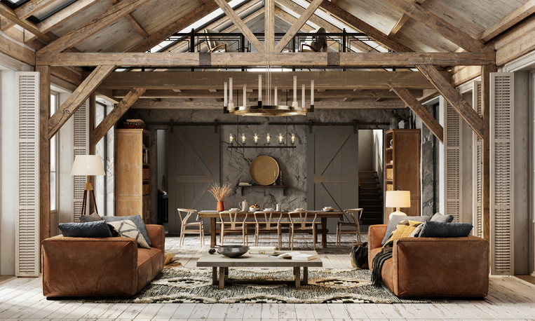 a-rustic-living-area-with-weathered-wood-beams-and-leather-sofas-against-the-backdrop-of-a-dining-table-and-grey-wall