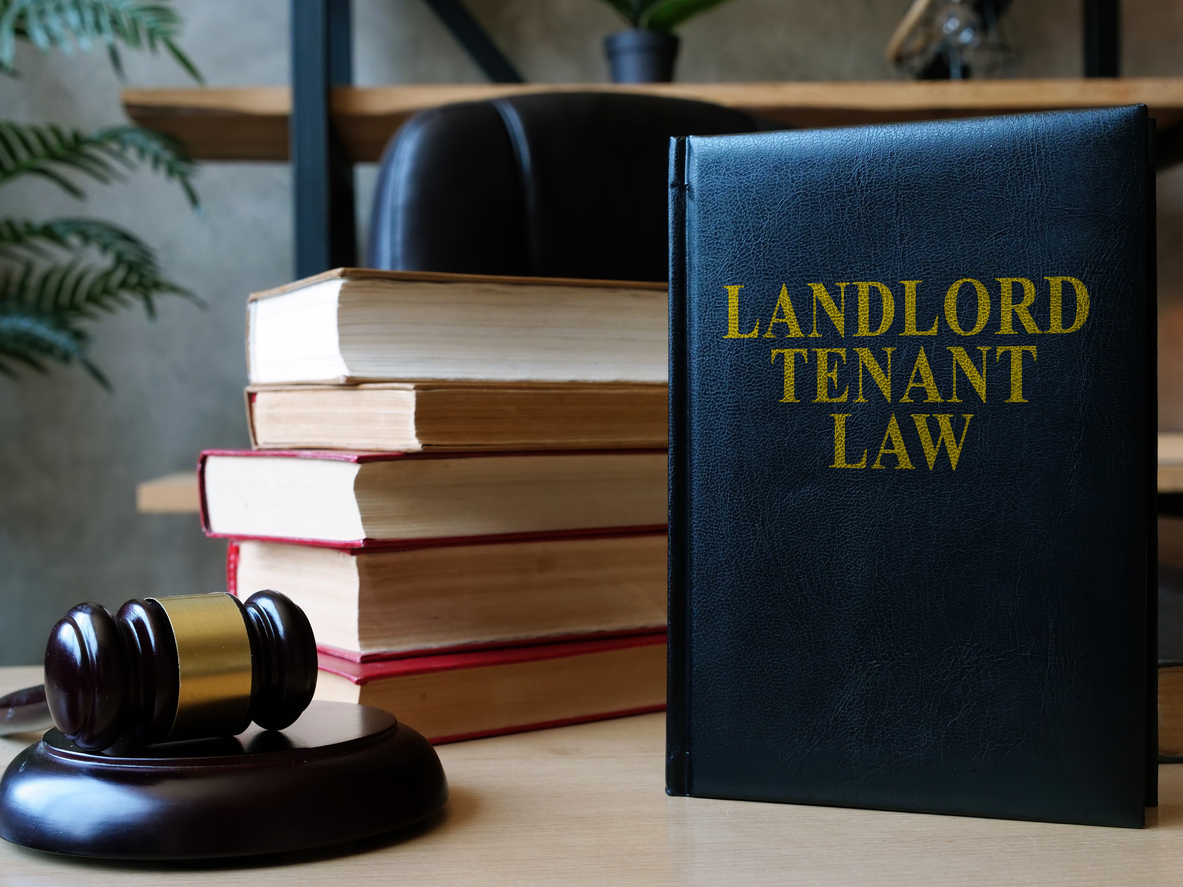 Landlord tenant law book on the lawyer desk