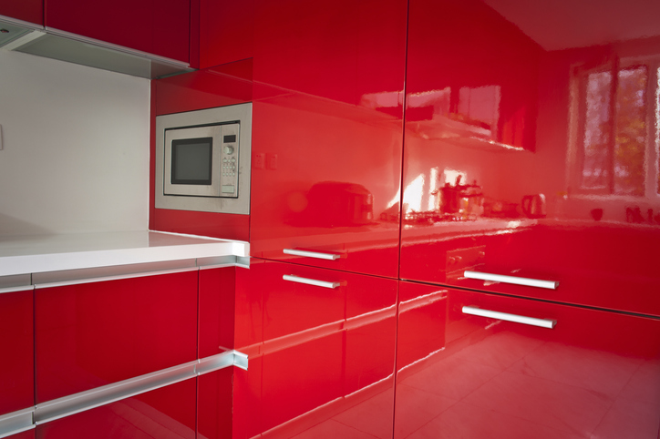 glossy-red-pantry-doors-in-a-red-modern-kitchen