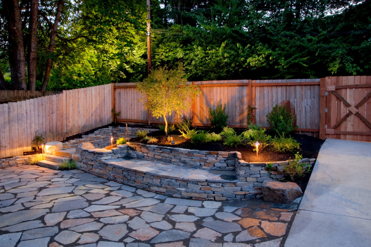 Backyard with hardscaped patio.