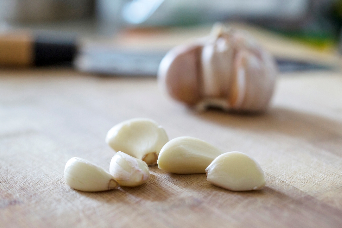 Peeled garlic on table