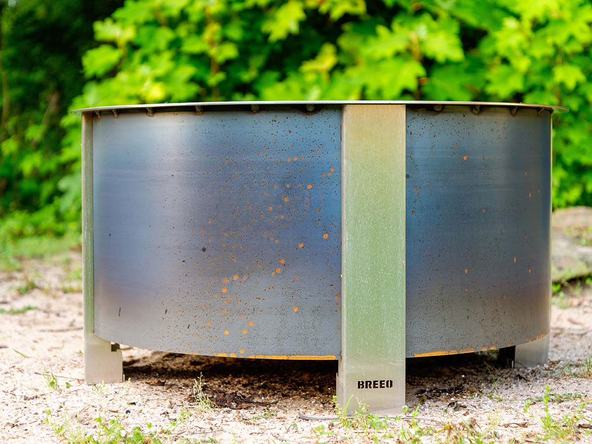 A photo showing the blue/gray appearance of the Breeo fire pit's corten steel walls