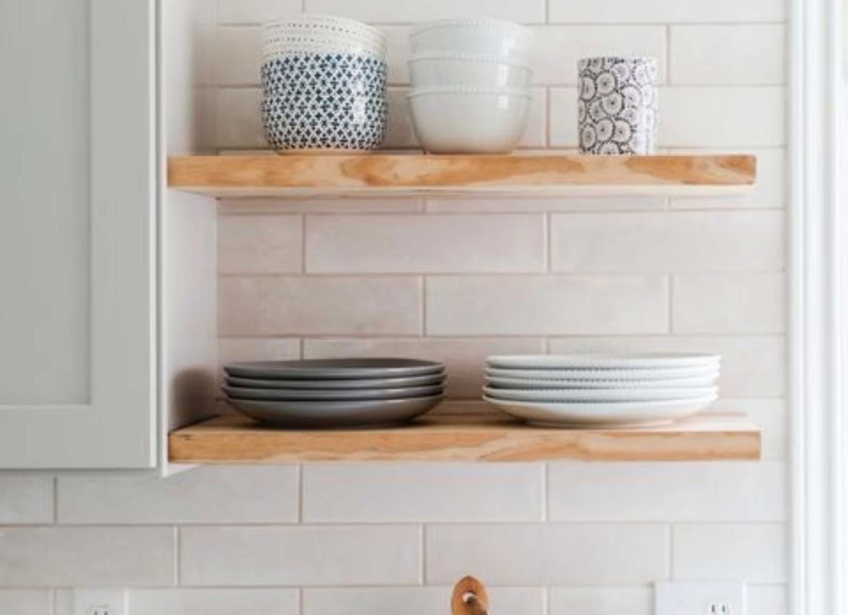Unstained wooden floating kitchen shelves