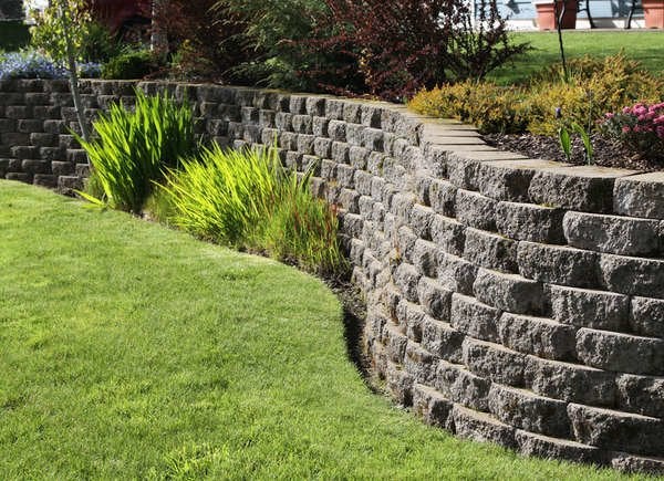 Retaining wall built into a hilly. back yard