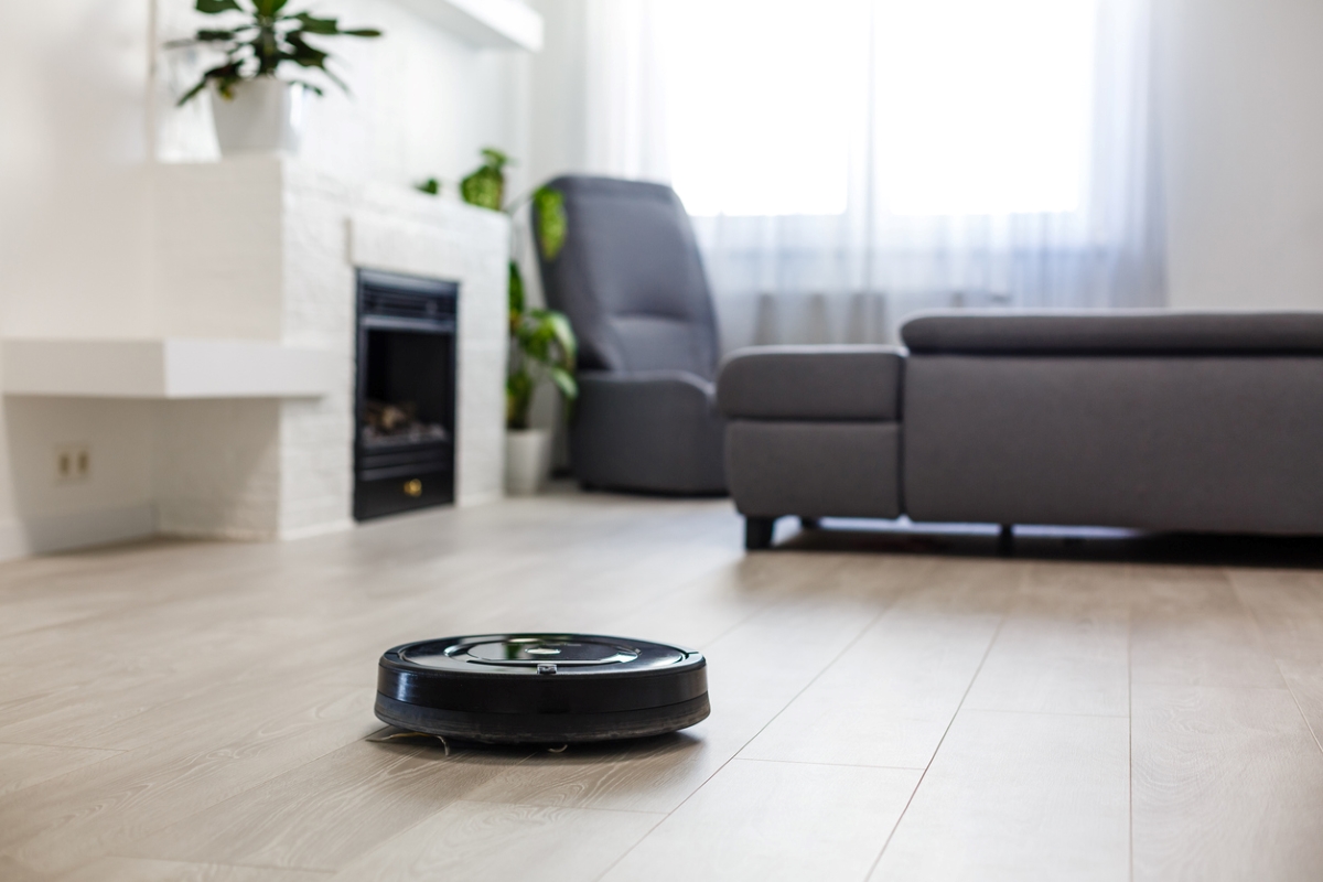 Smart vacuum on living room floor