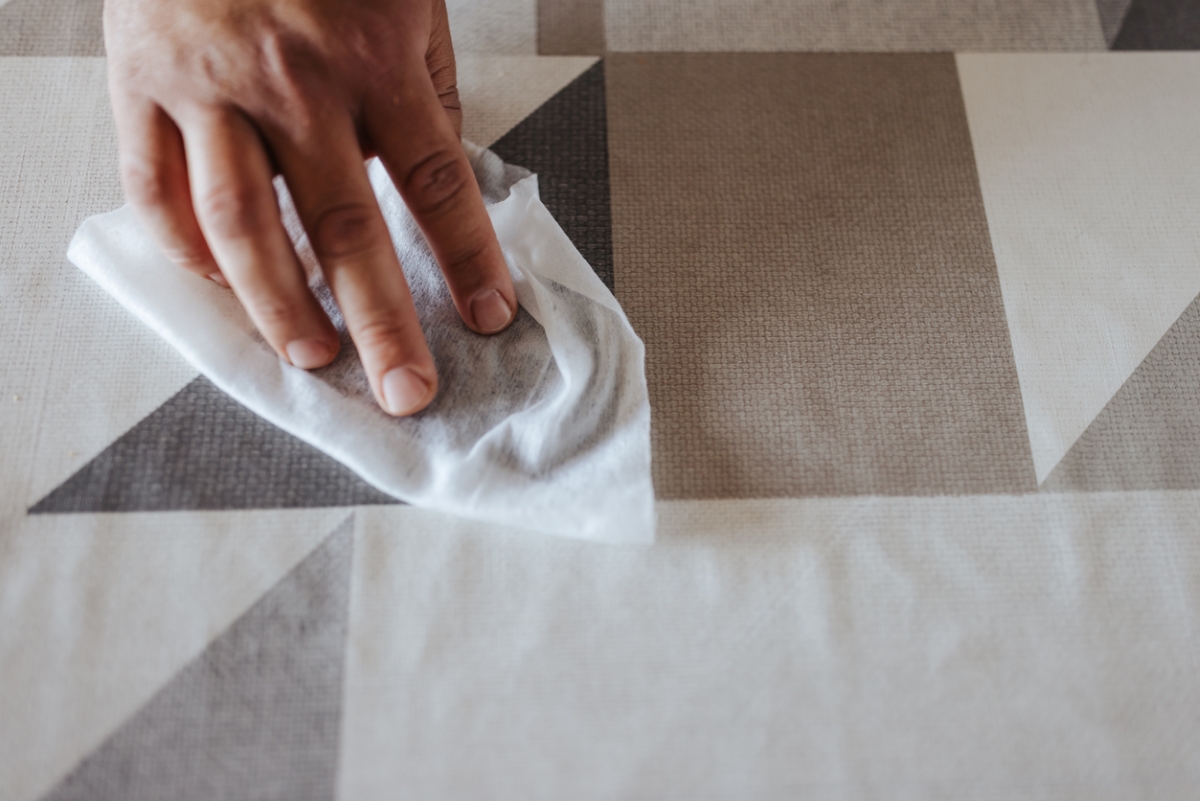 Wiping table with white sheet