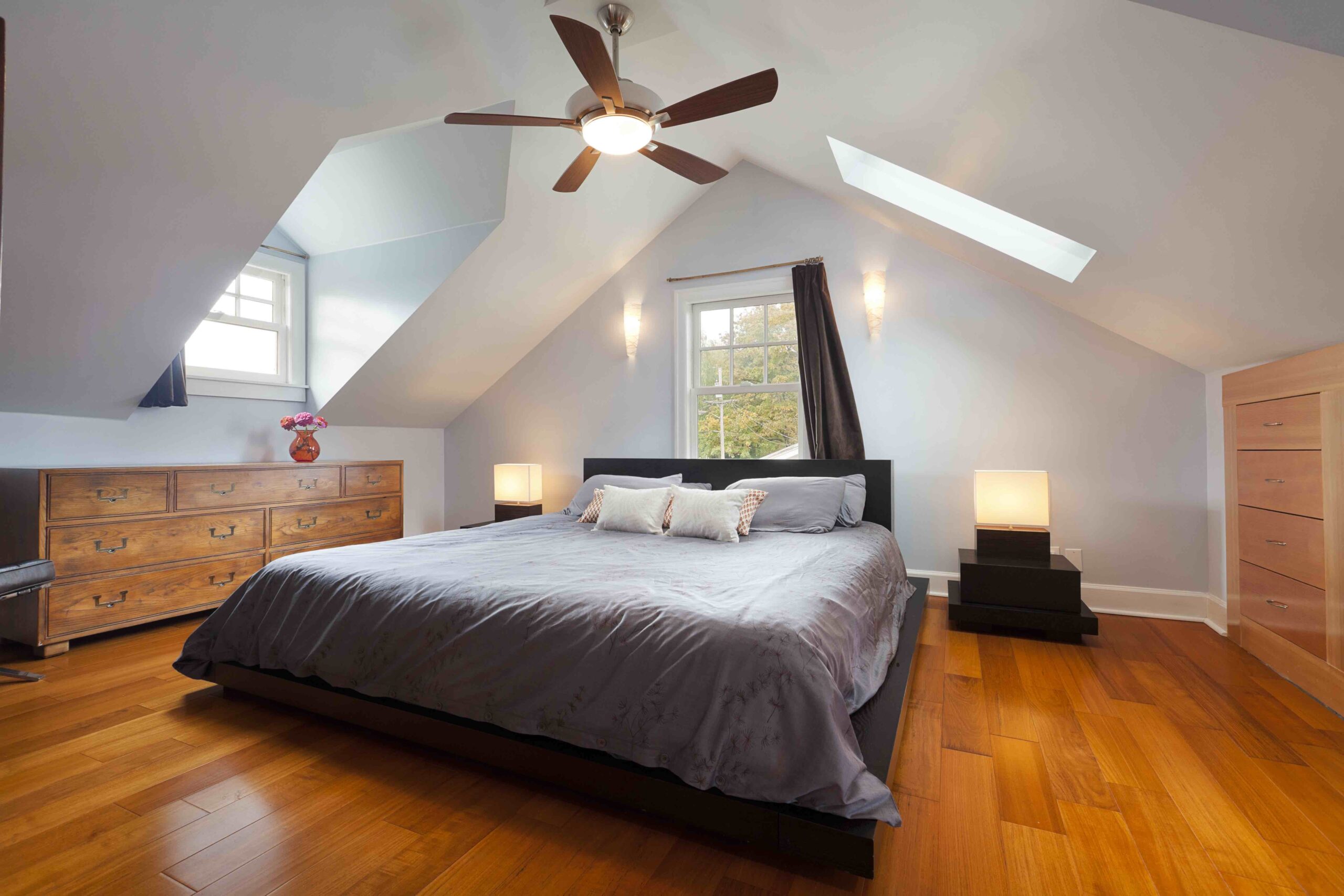 Attic Bedroom with ceiling fan
