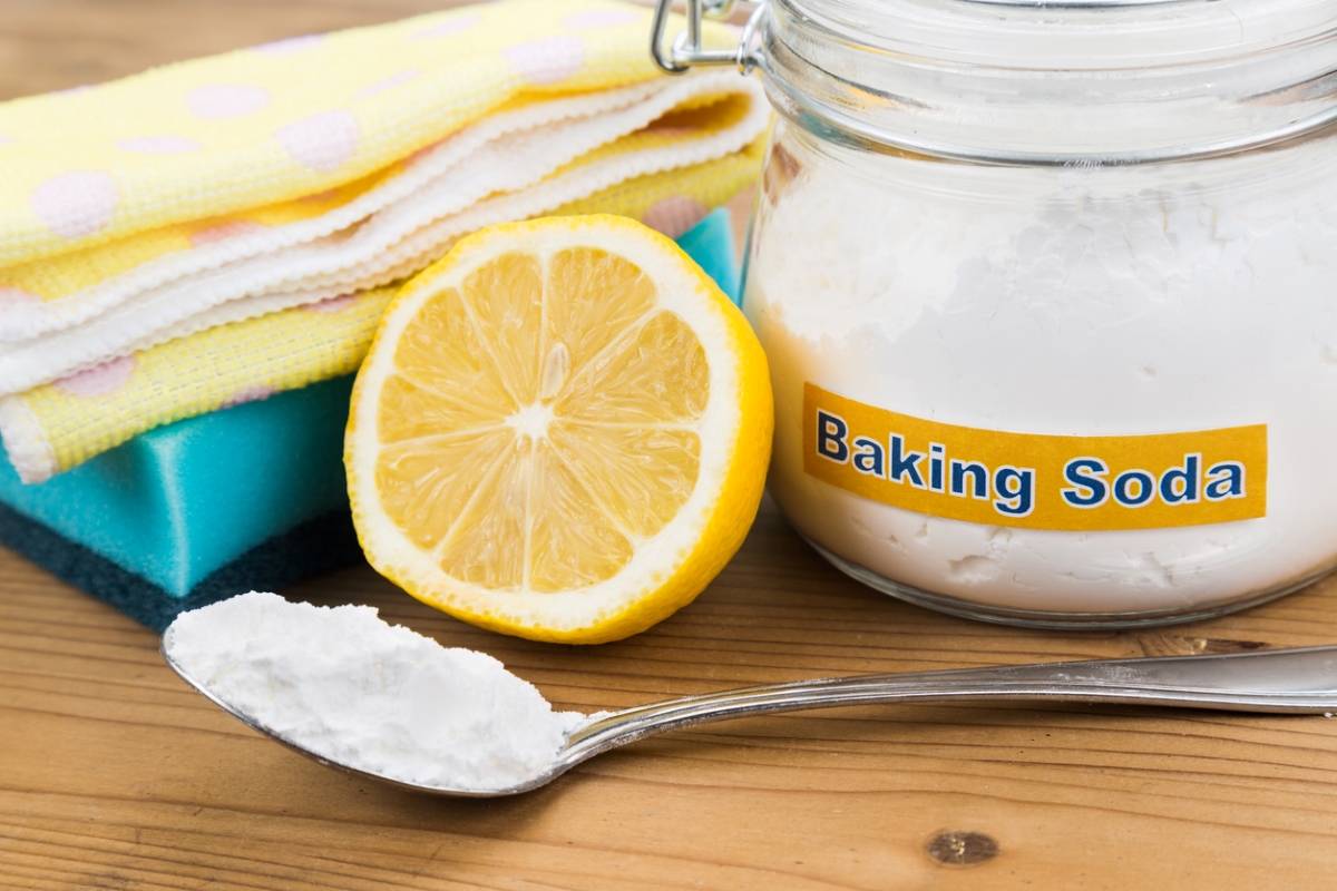 Baking soda with lemon and towels