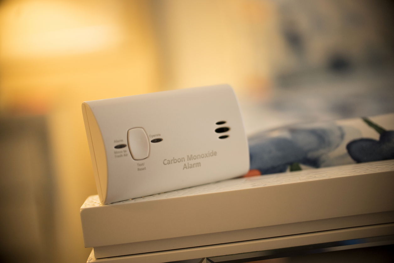 carbon monoxide detector on edge of bed