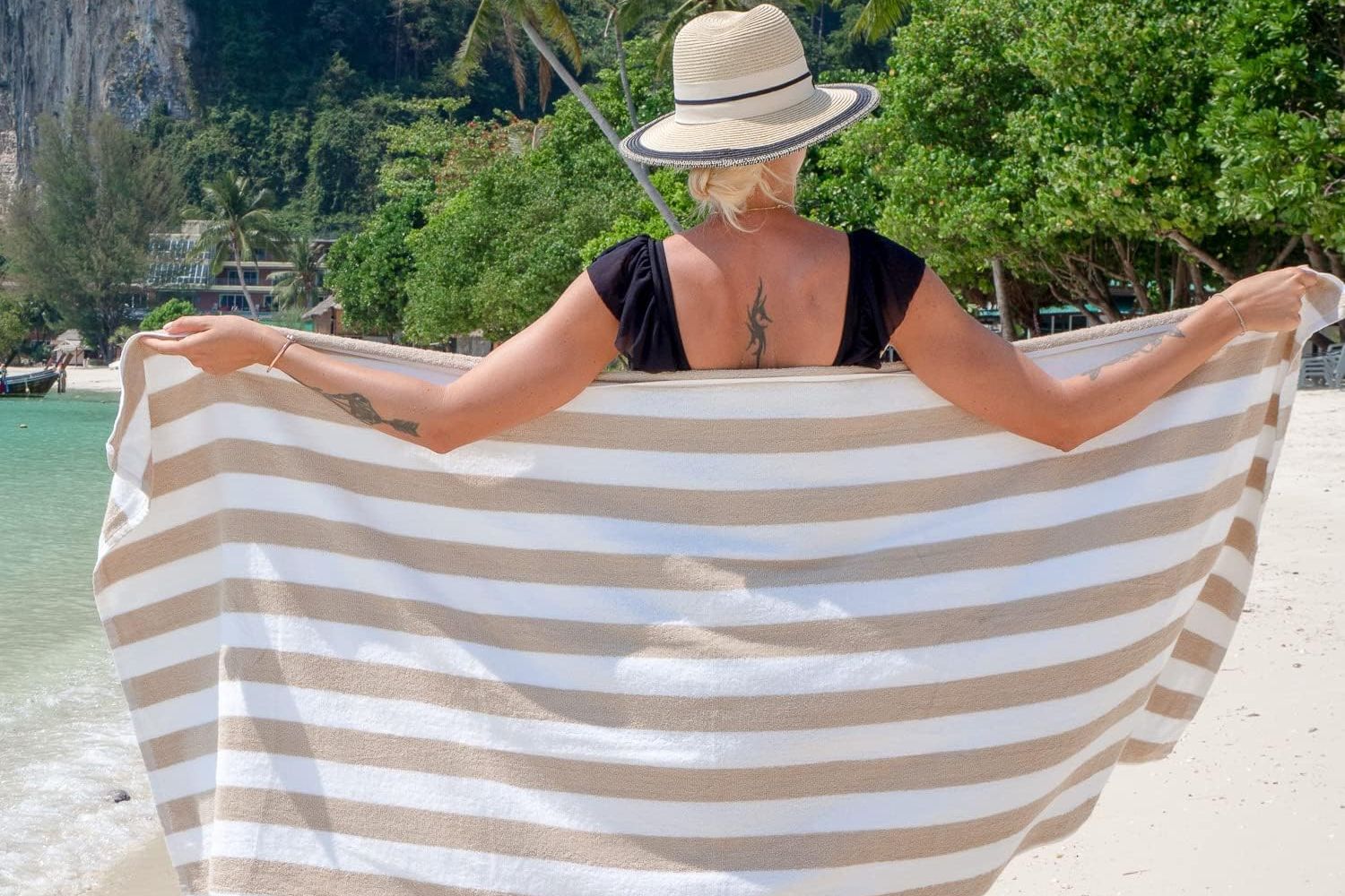 a woman wrapped with Arkwright Oversized California Beach Towels