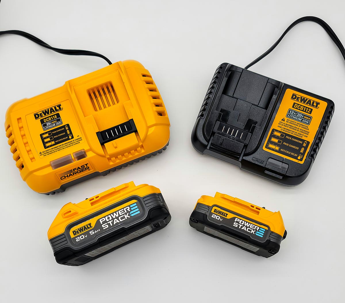 Two DeWalt PowerStack Batteries and chargers pictured side by side