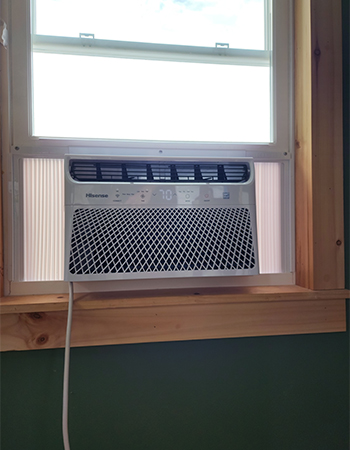 Hisense Air Conditioner installed in white vinyl window