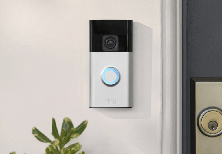 A white Ring doorbell camera.