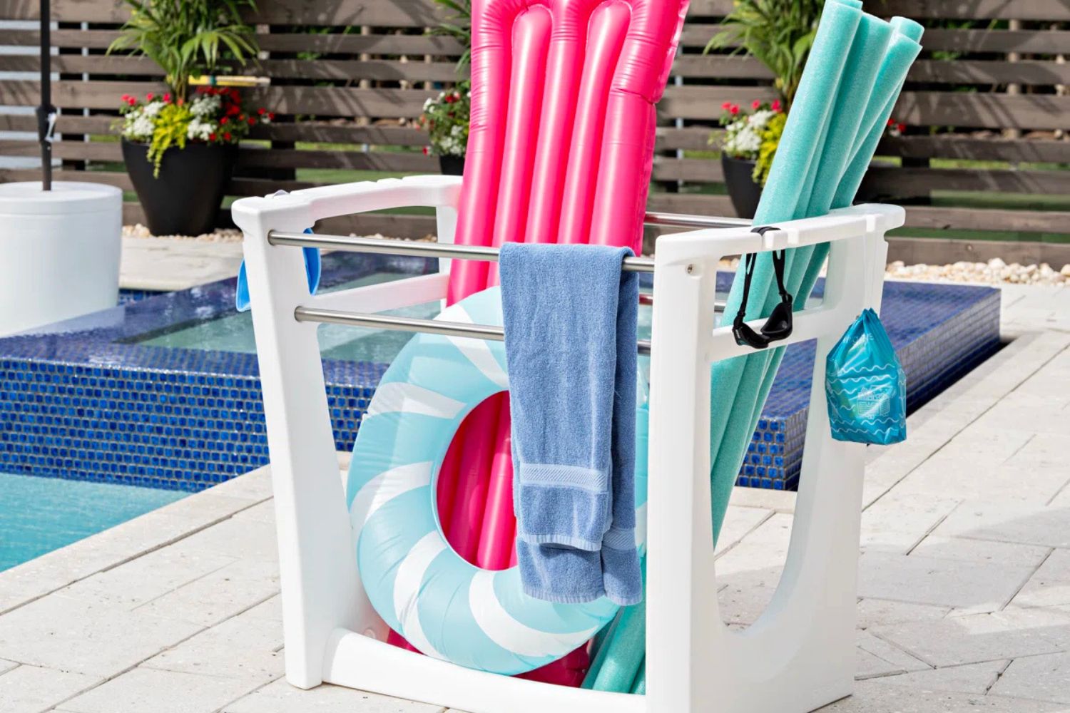 Step2 Vero Poolside Organizer besides a pool