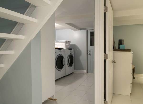 View of basement with washer dryer