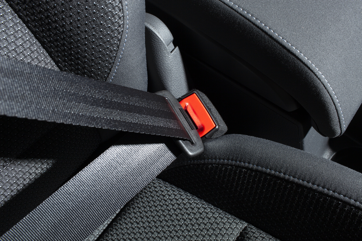 close up on buckled seat belt