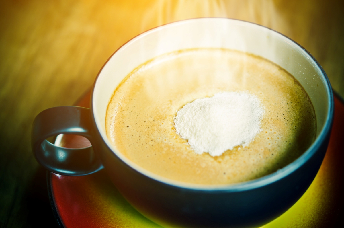Powdered creamer on hot coffee