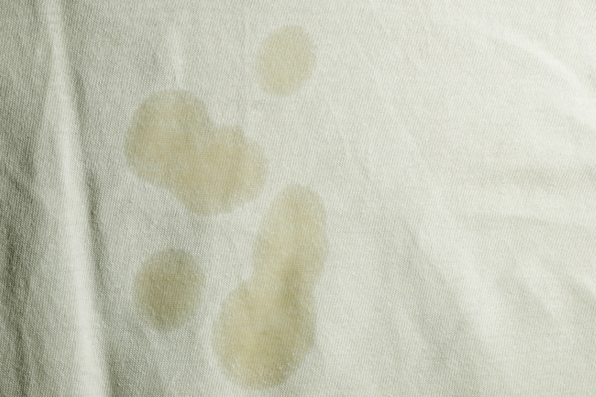 Oil stains on white fabric
