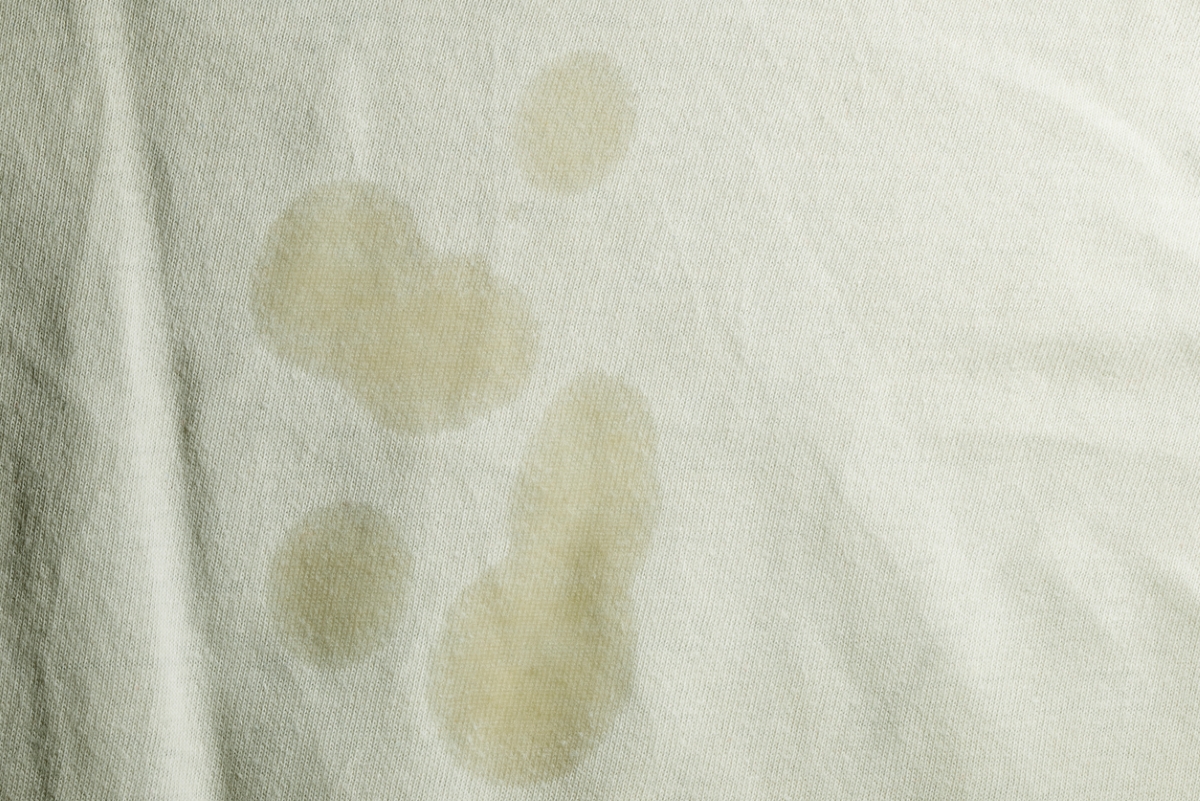 Oil stains on white fabric
