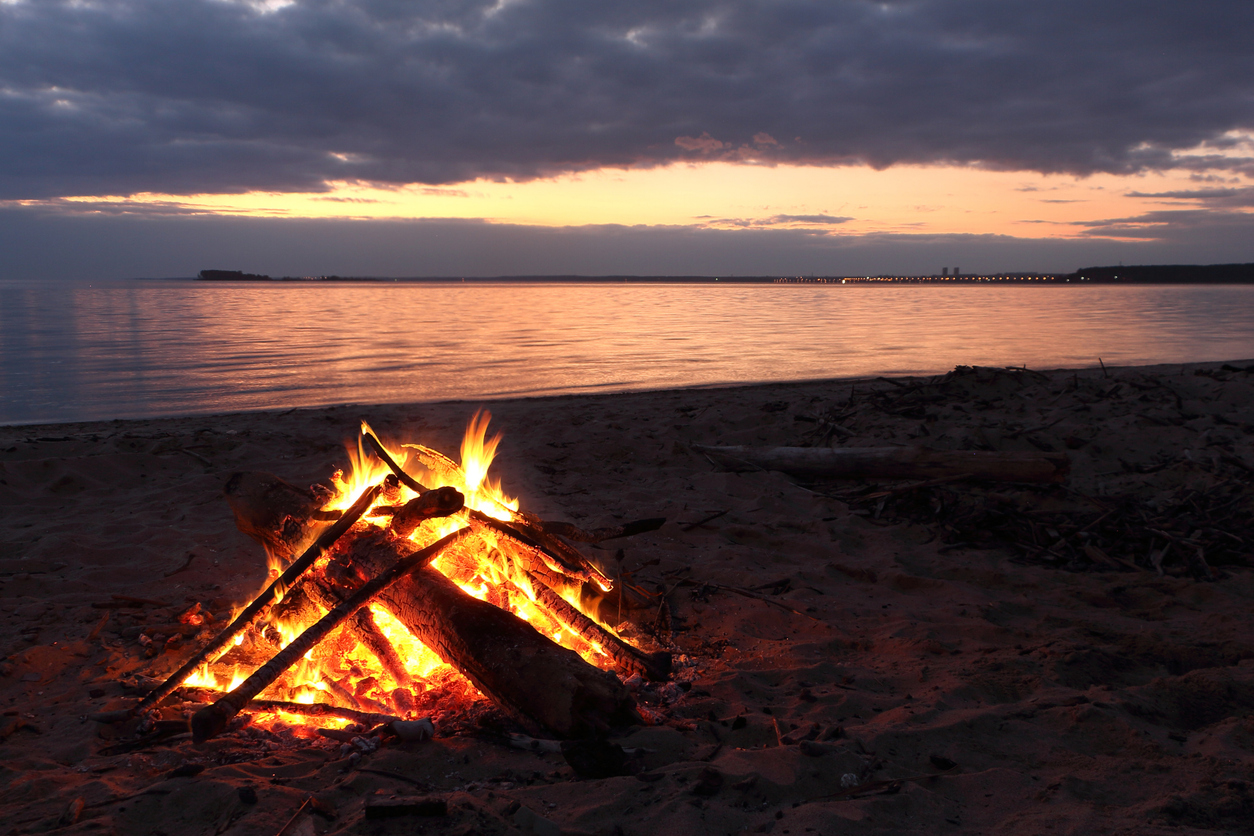 bonfire on beach at night