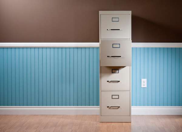 Filing cabinet with one open drawer