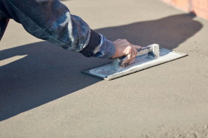 How to Fix Cracks in Concrete Driveways, Patios, and Sidewalks