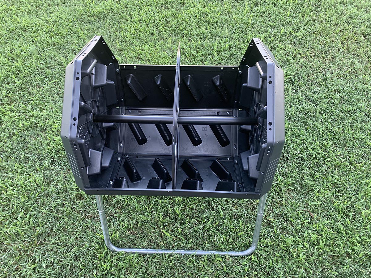 The FCMP Outdoor tumbling composter partially set up to show capacity and internal design