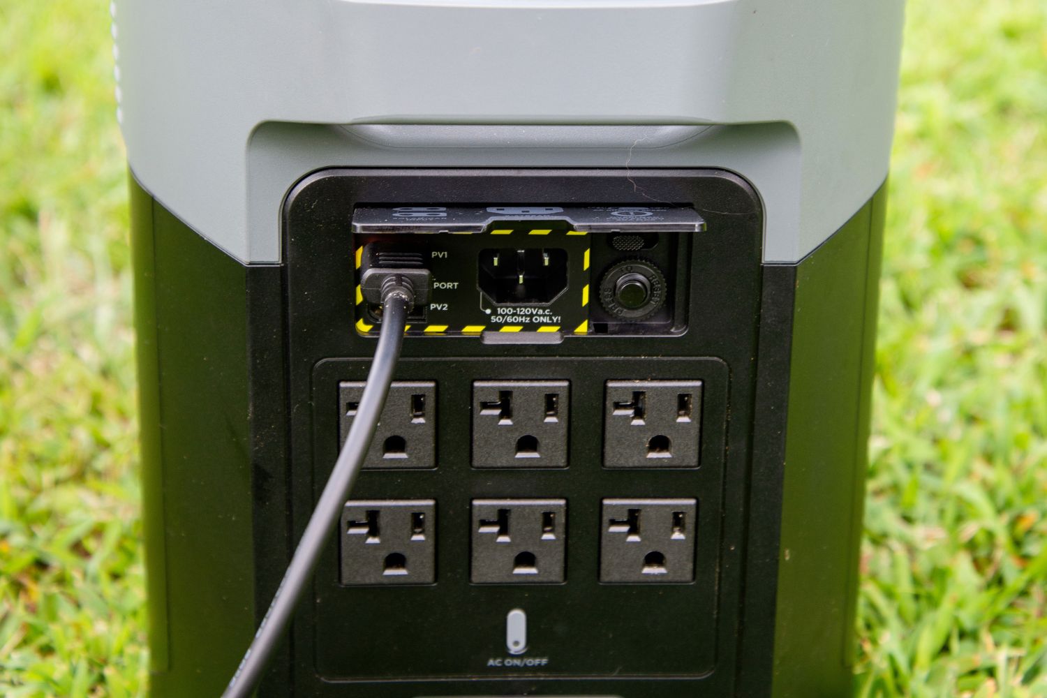 A close-up of the input and output ports on the EcoFlow Delta 2 Max solar generator