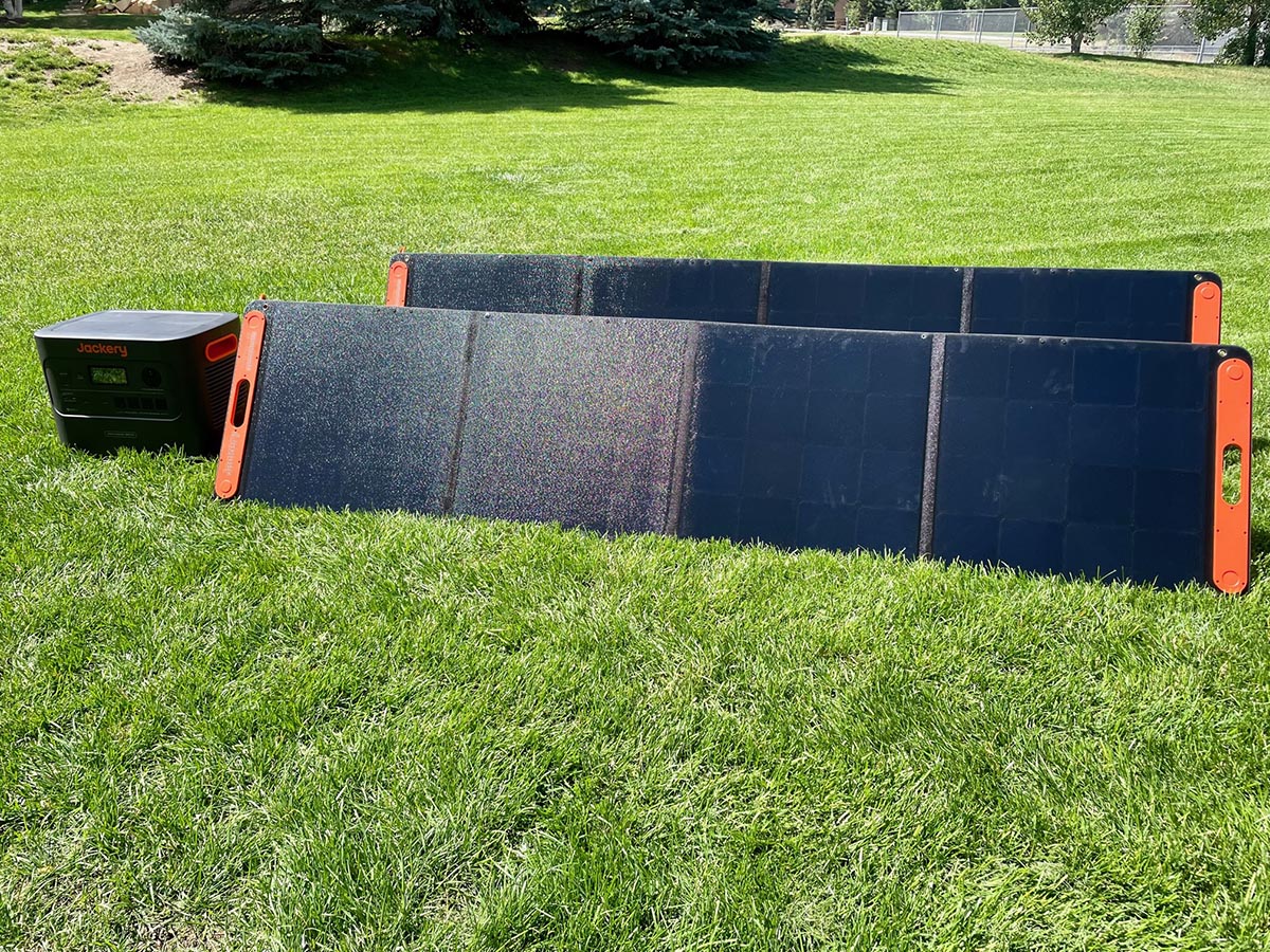 The Jackery 3000 Pro Solar Generator solar panels set up in a sunny yard