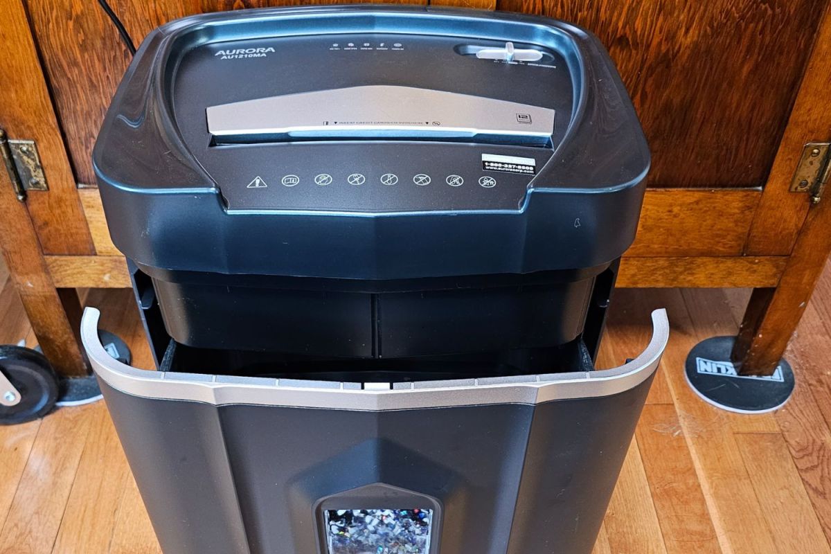 The Aurora paper shredder with its waste bin open