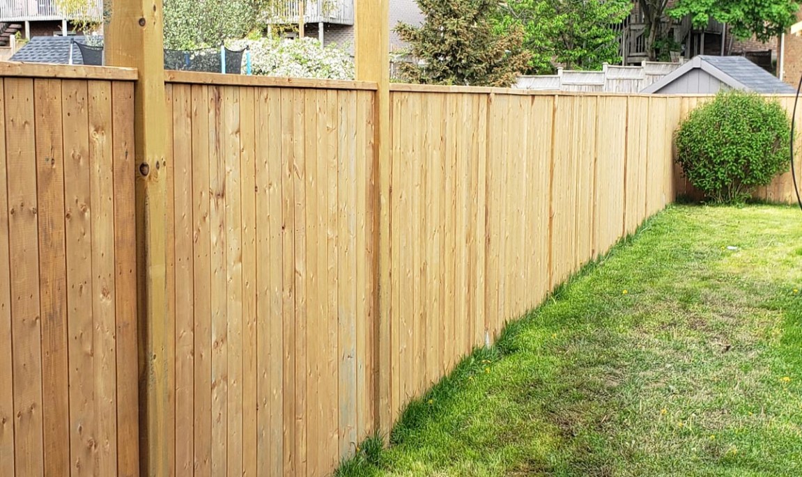 Image showcasing Vinyl Fence Cost vs. Wood Fence Cost: Which Option Is Best for You?