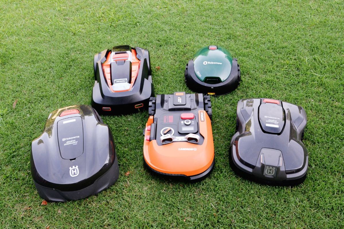 A group of the best robotic lawn mowers tested, with the Worx Landroid M robotic lawn mower front and center