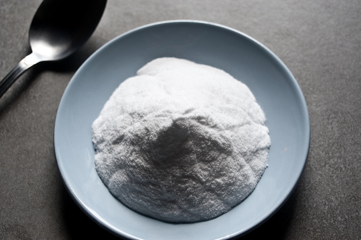 A small bowl of baking soda.