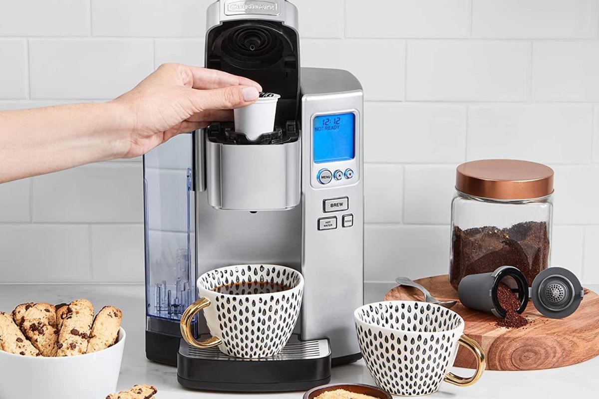 A person putting a coffee pod into the best single-serve coffee maker option
