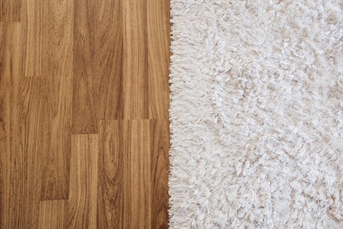 The Cost of Carpet vs. Laminate: 7 Factors to Consider When Choosing New Flooring