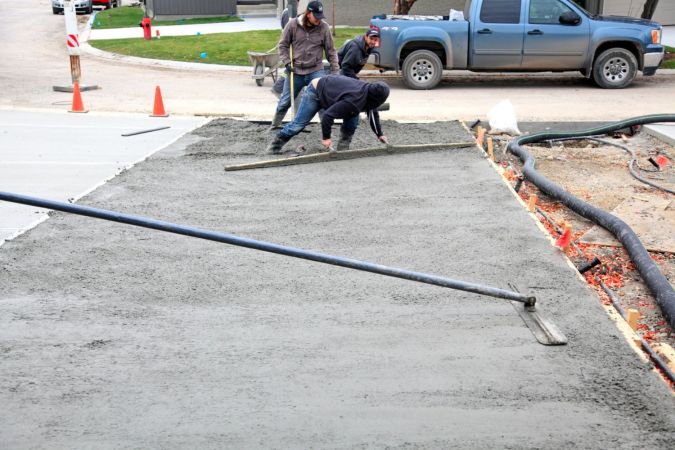 The Cost of Asphalt vs Concrete Driveway Cost: 9 Factors to Consider